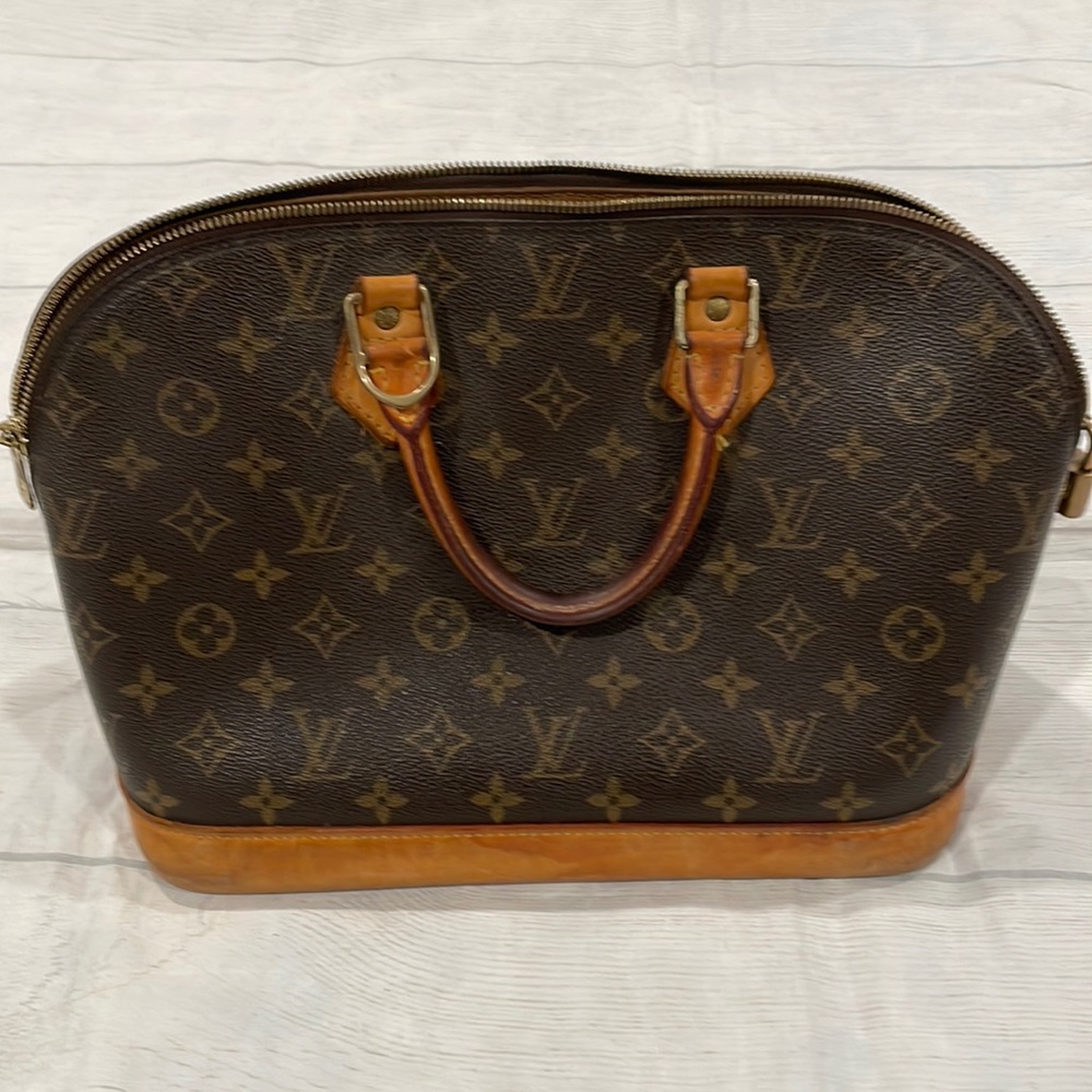 Louis Vuitton Alma PM bag used